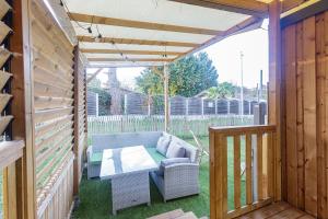 Et opholdsområde på Mobil home 408 tout confort + 2 billeder