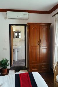 Postel nebo postele na pokoji v ubytování Eco Home Kathmandu