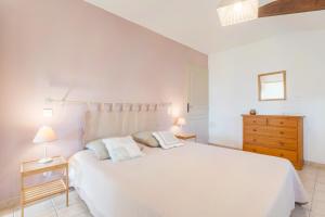 Postel nebo postele na pokoji v ubytování Le Petit Etang + 12 fotografií