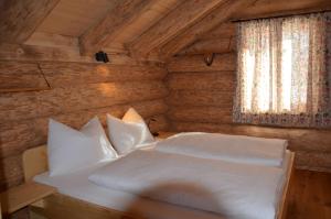 Ένα ή περισσότερα κρεβάτια σε δωμάτιο στο Ferner Alm