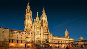 ein großes Gebäude mit zwei Türmen darüber in der Unterkunft Luxury Apartment with Sea View in Malpica, 230 sq.m in Malpica