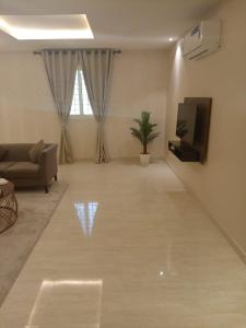 Istumisnurk majutusasutuses شقق خزامى المخدومه