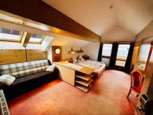 Ένα ή περισσότερα κρεβάτια σε δωμάτιο στο Hotel Garni Hainbacherhof