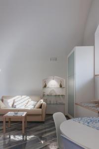 Ένα ή περισσότερα κρεβάτια σε δωμάτιο στο Casa di zia Nunzia