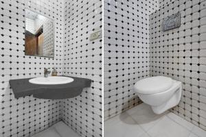 Ένα μπάνιο στο FabHotel Family Inn