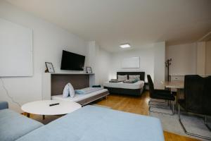 Ένα ή περισσότερα κρεβάτια σε δωμάτιο στο Ferienwohnung Dado