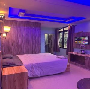 Ένα ή περισσότερα κρεβάτια σε δωμάτιο στο Lahaven Guest House