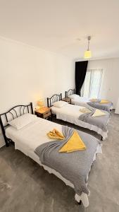 Postel nebo postele na pokoji v ubytování Villa Kaan