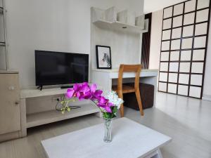 TV a/nebo společenská místnost v ubytování Nimman 2Bedrooms