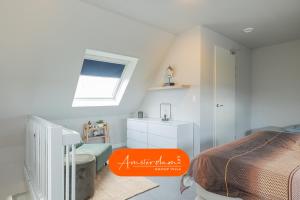Ένα ή περισσότερα κρεβάτια σε δωμάτιο στο Amsterdam Cottage 8 beds 2 bedrooms