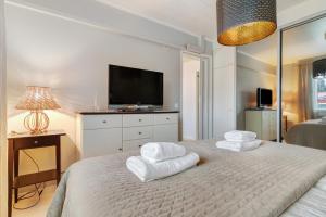 Ένα ή περισσότερα κρεβάτια σε δωμάτιο στο Frostlight Villa