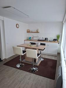 Fotografie z fotogalerie ubytování Ferienwohnung Waldblick mit Sauna v destinaci Deutschneudorf