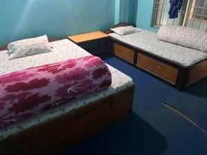 Postel nebo postele na pokoji v ubytování Shubh laxmi hotel Itahari