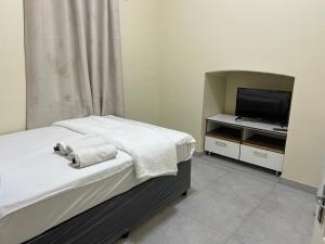 Μια τηλεόραση ή/και κέντρο ψυχαγωγίας στο M Lodge