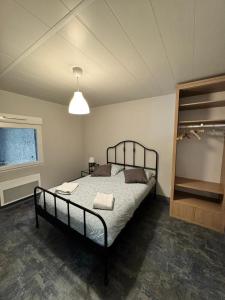 a bedroom with a bed in a room at Coeur d'Argonne in Dombasle-en-Argonne +20 photos