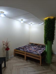 Ένα ή περισσότερα κρεβάτια σε δωμάτιο στο Domus025