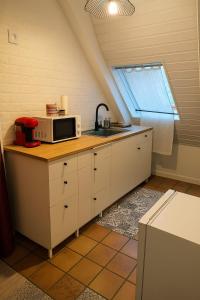 Η κουζίνα ή μικρή κουζίνα στο Escapade Secrète +3 φωτογραφίες