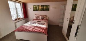 Ένα ή περισσότερα κρεβάτια σε δωμάτιο στο Glorios