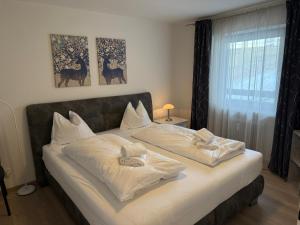 Ένα ή περισσότερα κρεβάτια σε δωμάτιο στο Haus Panorama Seefeld