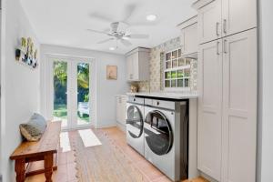 a kitchen with a washer and dryer at Lavender Lagoon in Anna Maria