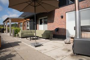 Imagen de la galería de Villa Crème de la Kremmer met Hottub & Sauna | 8 personen, en Gasselte