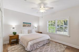 Ένα ή περισσότερα κρεβάτια σε δωμάτιο στο Simone Tranquilla - 2010 Bruce Drive