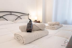 Ένα ή περισσότερα κρεβάτια σε δωμάτιο στο New Modern Apt- Center 10min - Hiper WiFi - A-C