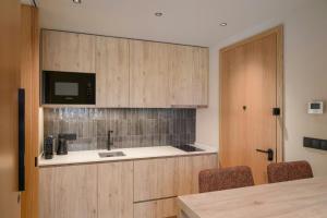 Η κουζίνα ή μικρή κουζίνα στο Residence Inn by Marriott Lisbon +16 φωτογραφίες