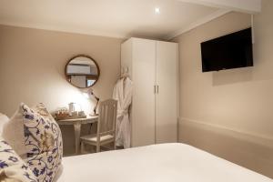 Ένα ή περισσότερα κρεβάτια σε δωμάτιο στο The Antrim Collection by Totalstay +45 φωτογραφίες