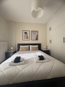 Postel nebo postele na pokoji v ubytování G&M Home