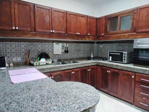 Kuchyň nebo kuchyňský kout v ubytování Appartement Casa Voyageurs