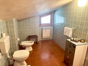 Koupelna v ubytování Casa Vacanze Montane + 2 fotografie