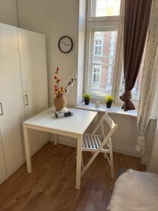 Ένα ή περισσότερα κρεβάτια σε δωμάτιο στο Pokoje przy Rynku I