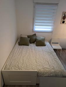 Postel nebo postele na pokoji v ubytování City Break Arras + 12 fotografií