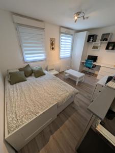 Postel nebo postele na pokoji v ubytování City Break Arras