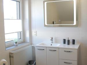 Ένα μπάνιο στο Ferienwohnung Niemeier +29 φωτογραφίες