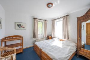 Postel nebo postele na pokoji v ubytování Sous le Cielle d'Ardenne + 9 fotografií