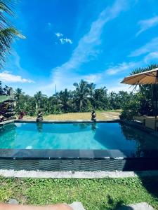 Πισίνα στο ή κοντά στο Nia cahya ubud villa