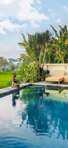 Πισίνα στο ή κοντά στο Nia cahya ubud villa