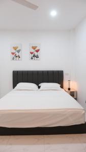 Voodi või voodid majutusasutuse Modern Private Pool Villa in Sukhumvit toas