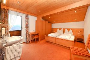 Postel nebo postele na pokoji v ubytování Rundblick 5 Ausblick