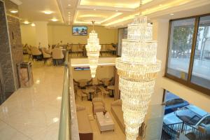 TV a/nebo společenská místnost v ubytování Yofel Hotel Bole