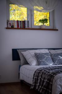 Postel nebo postele na pokoji v ubytování Domek na Szlaku