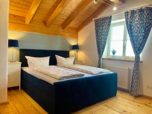 Postel nebo postele na pokoji v ubytování Haus Himmelswies Sommerbergbahnen Kostenlos