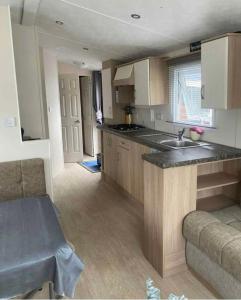 Kuchyň nebo kuchyňský kout v ubytování La Campine