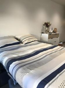 Postel nebo postele na pokoji v ubytování Petit nid douillet