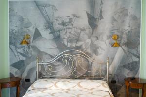 Una cama o camas en una habitación de Orizzonte Infinito b&b