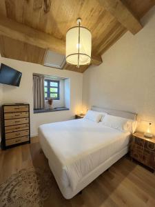 Postel nebo postele na pokoji v ubytování Hotel Apartamentos Casas da Fortaleza + 135 fotografií