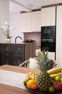 Nhà bếp/bếp nhỏ tại Apartman Lux Andria +14 ảnh