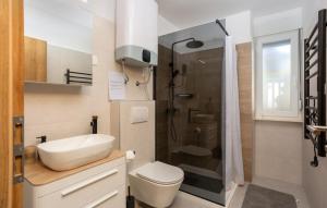 a bathroom with a toilet and a shower at Villa Aristea Crikvenica by Villas Guide in Škrljevo +46 photos